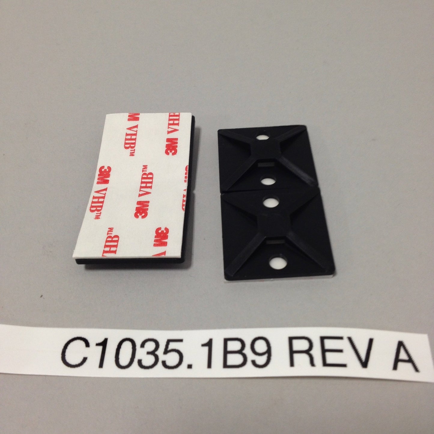 SELF ADHESIVE CABLE TIE MOUNT (C1035.1B9 Rev A)