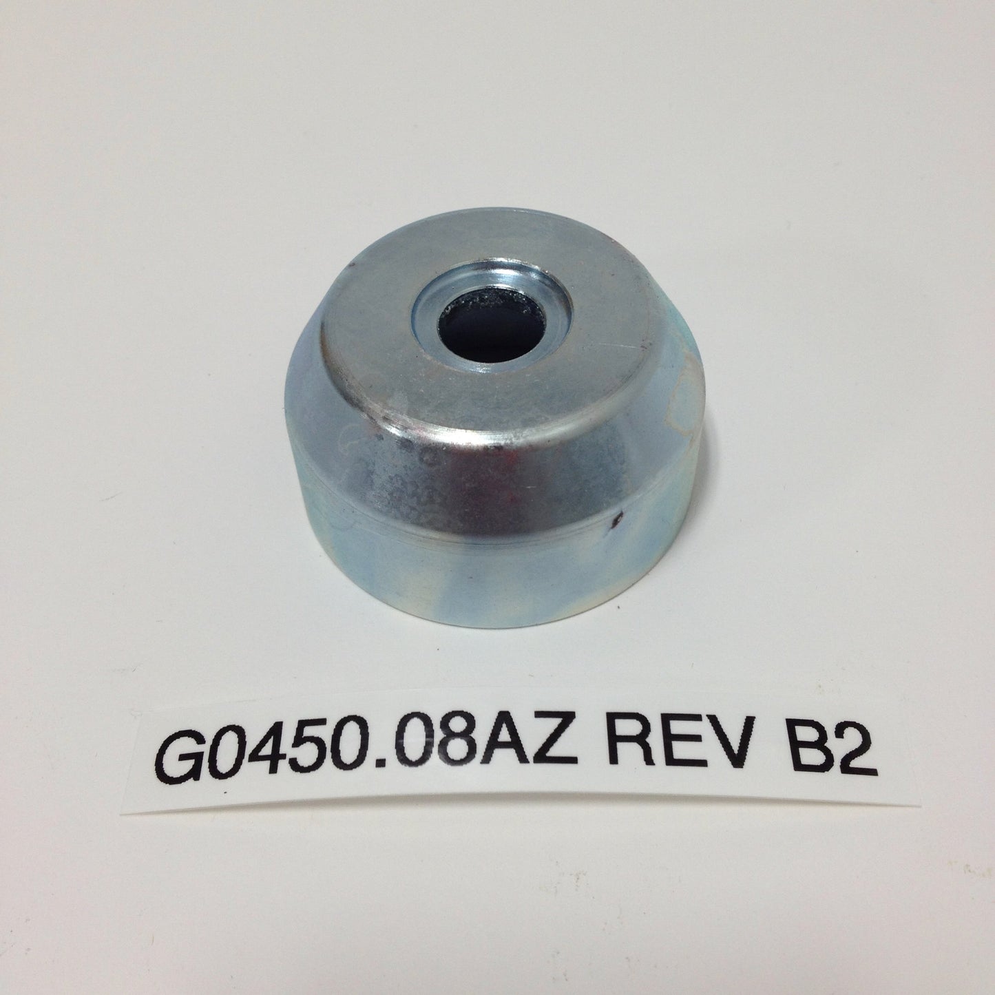 TRANSMISSION OUTPUT SPROCKET RETAINING CUP G0450.08AZ Rev B2