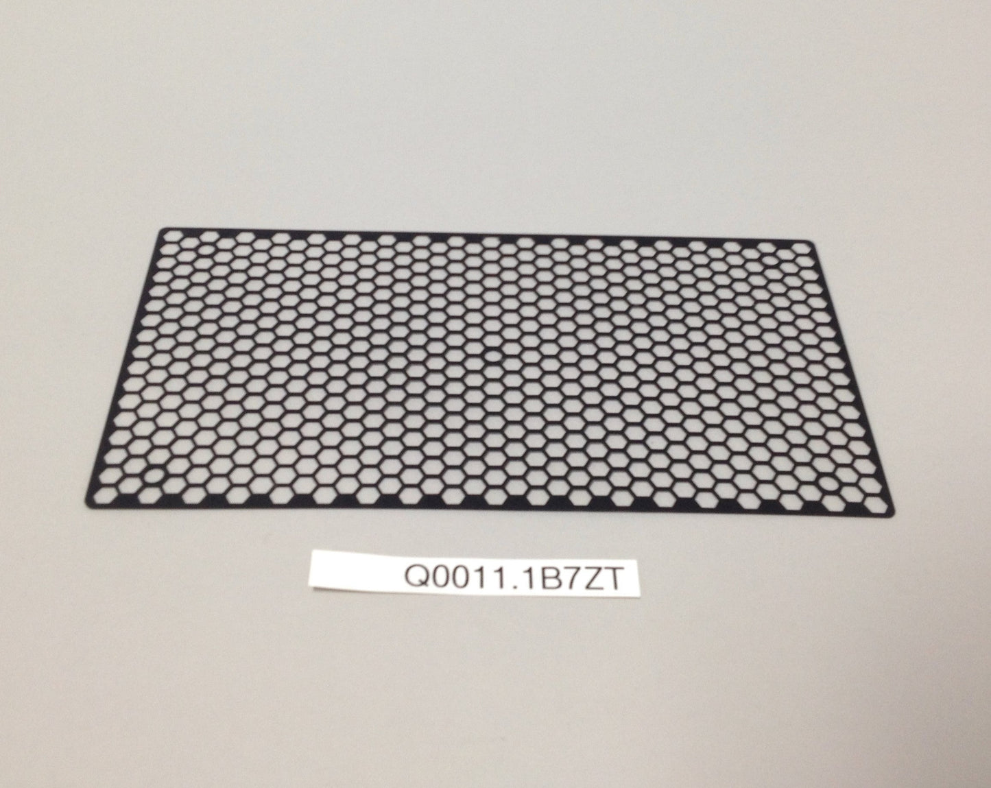 GRILLE, RADIATOR, BLACK, ANODIZED Q0011.1B7ZT Rev A