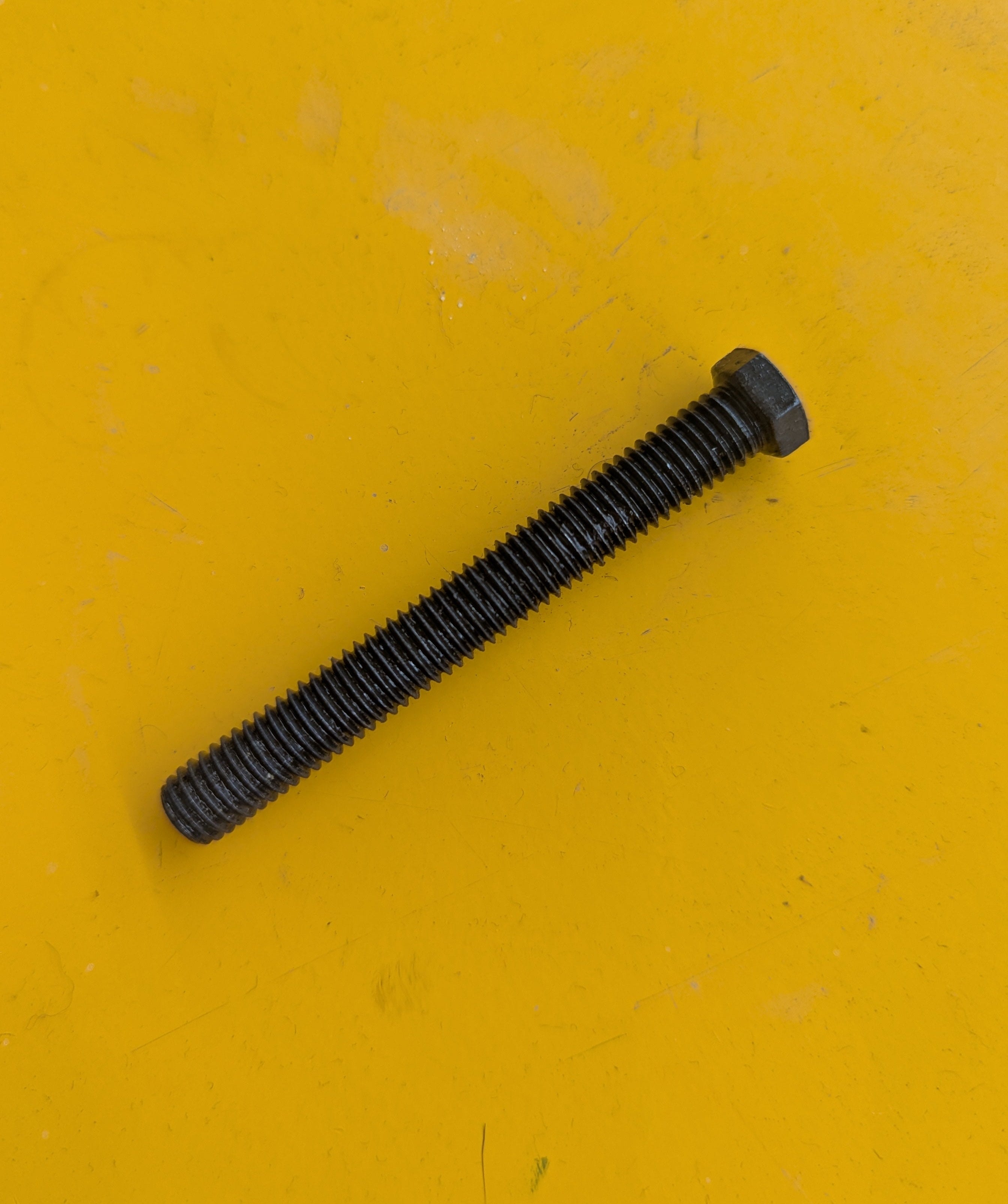 SCREW, M8 - 1.25 X 65MM, 10MM HEX HEAD, AXLE ADJUSTER (CA0122.1AY Rev C)