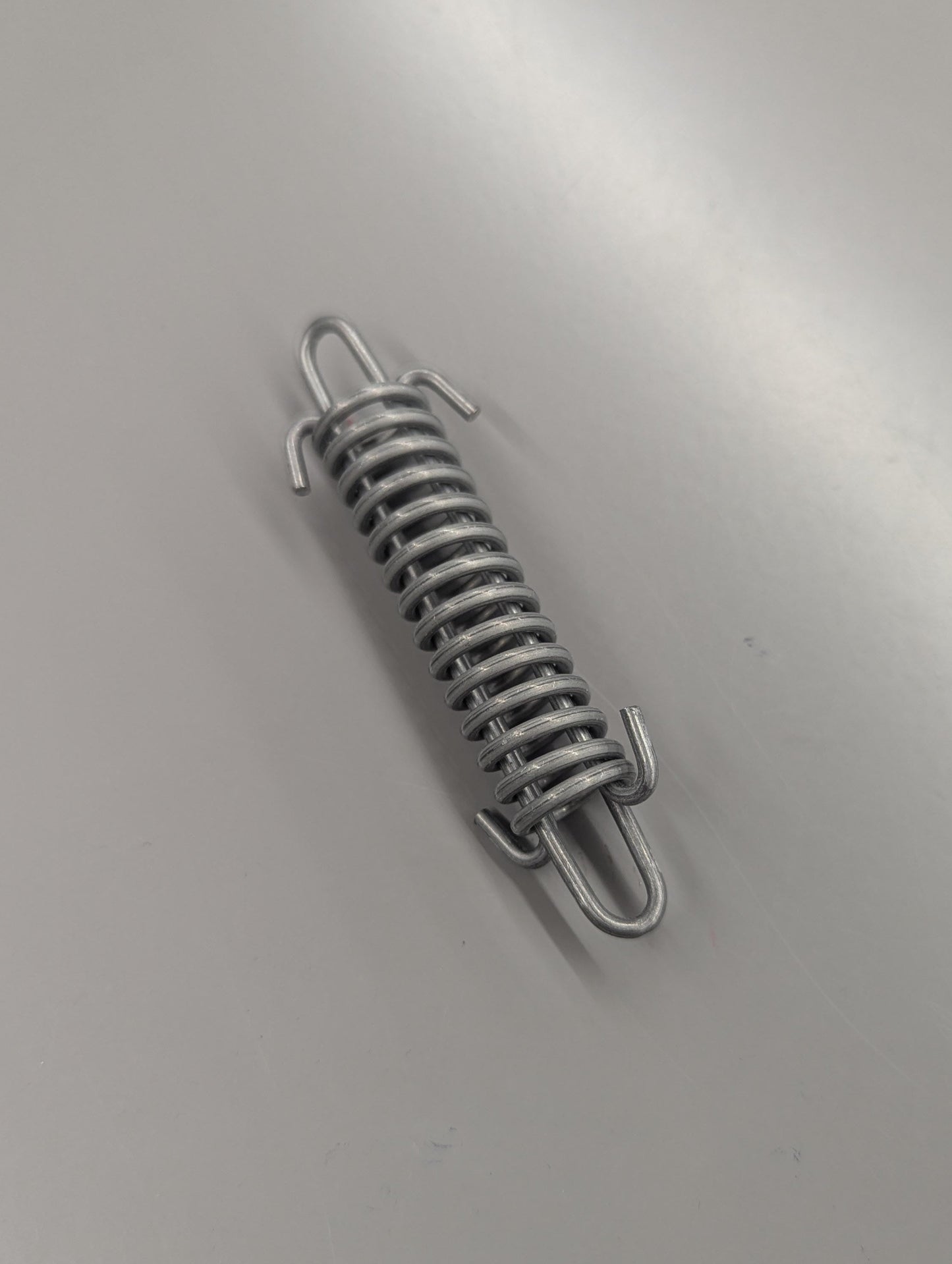 SPRING, EXHAUST (CG0012.08B2 Rev B)