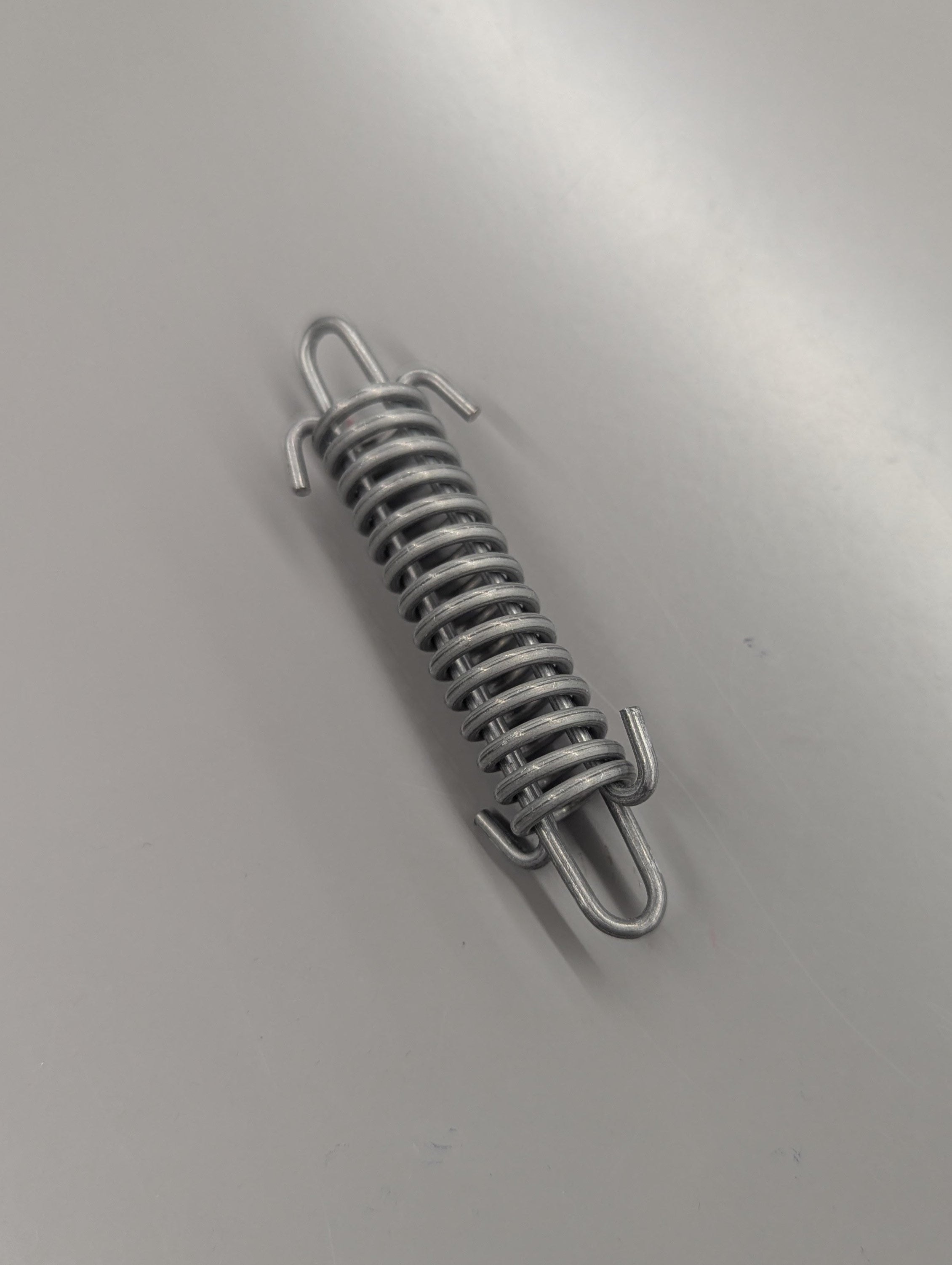 SPRING, EXHAUST (CG0012.08B2 Rev B)