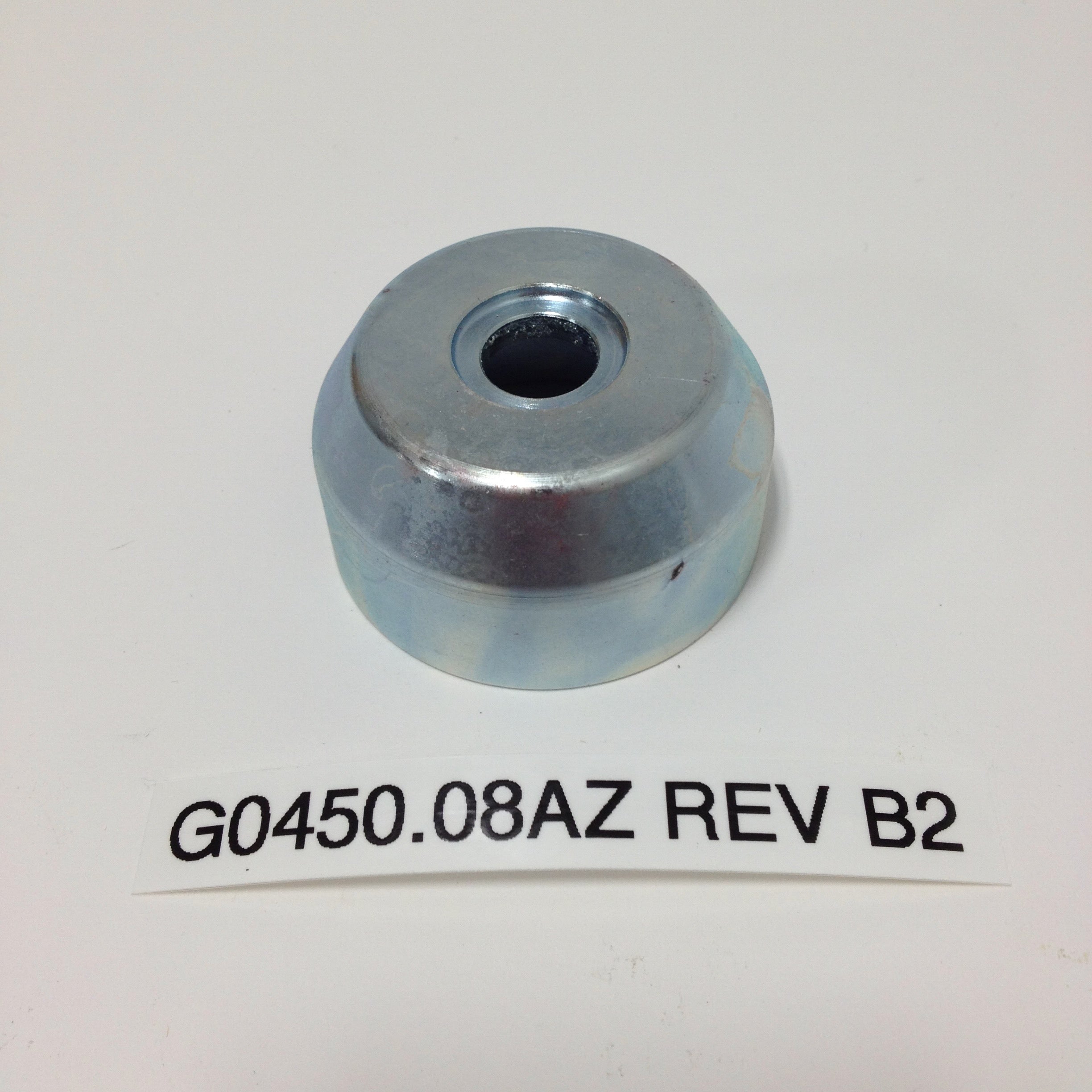 TRANSMISSION OUTPUT SPROCKET RETAINING CUP G0450.08AZ Rev B2