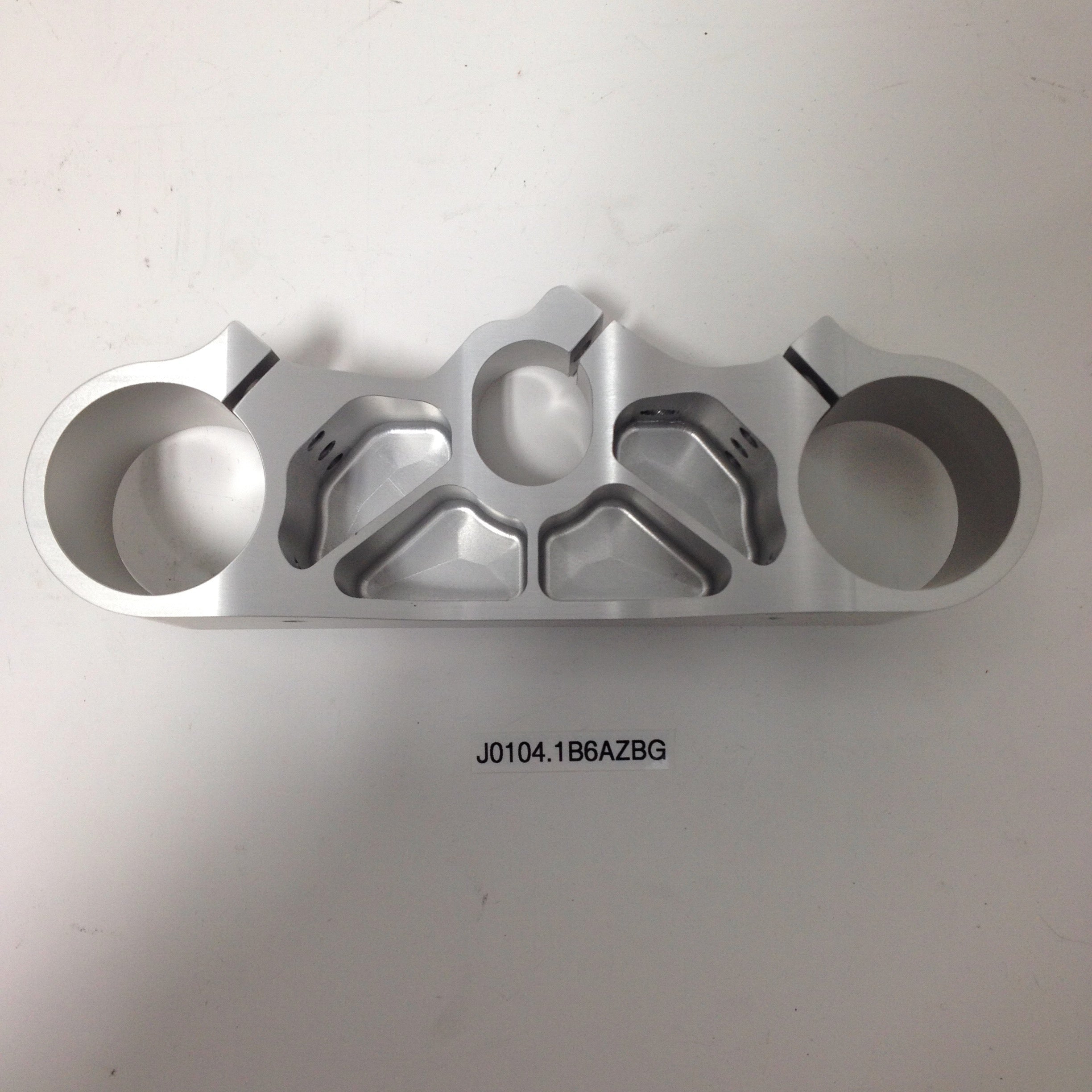 LOWER TRIPLE CLAMP, ADJ OFFST J0104.1B6AZBG Rev A