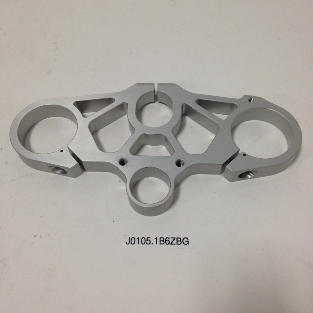 UPPER TRIPLE CLAMP, ADJ OFFST J0105.1B6ZBG Rev A