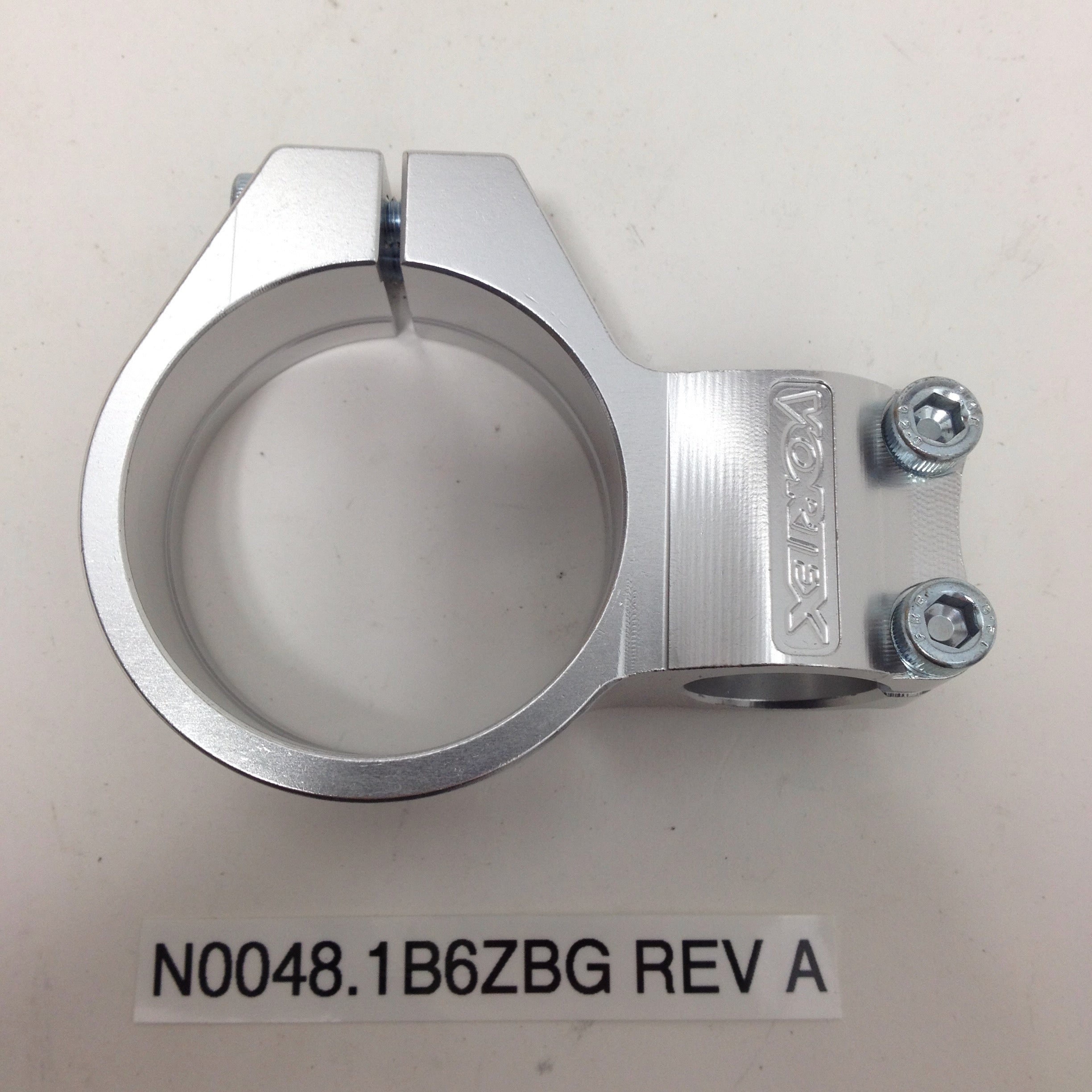 HANDLEBAR CLAMP, LEFT, CLEAR ANODIZED N0048.1B6ZBG Rev A