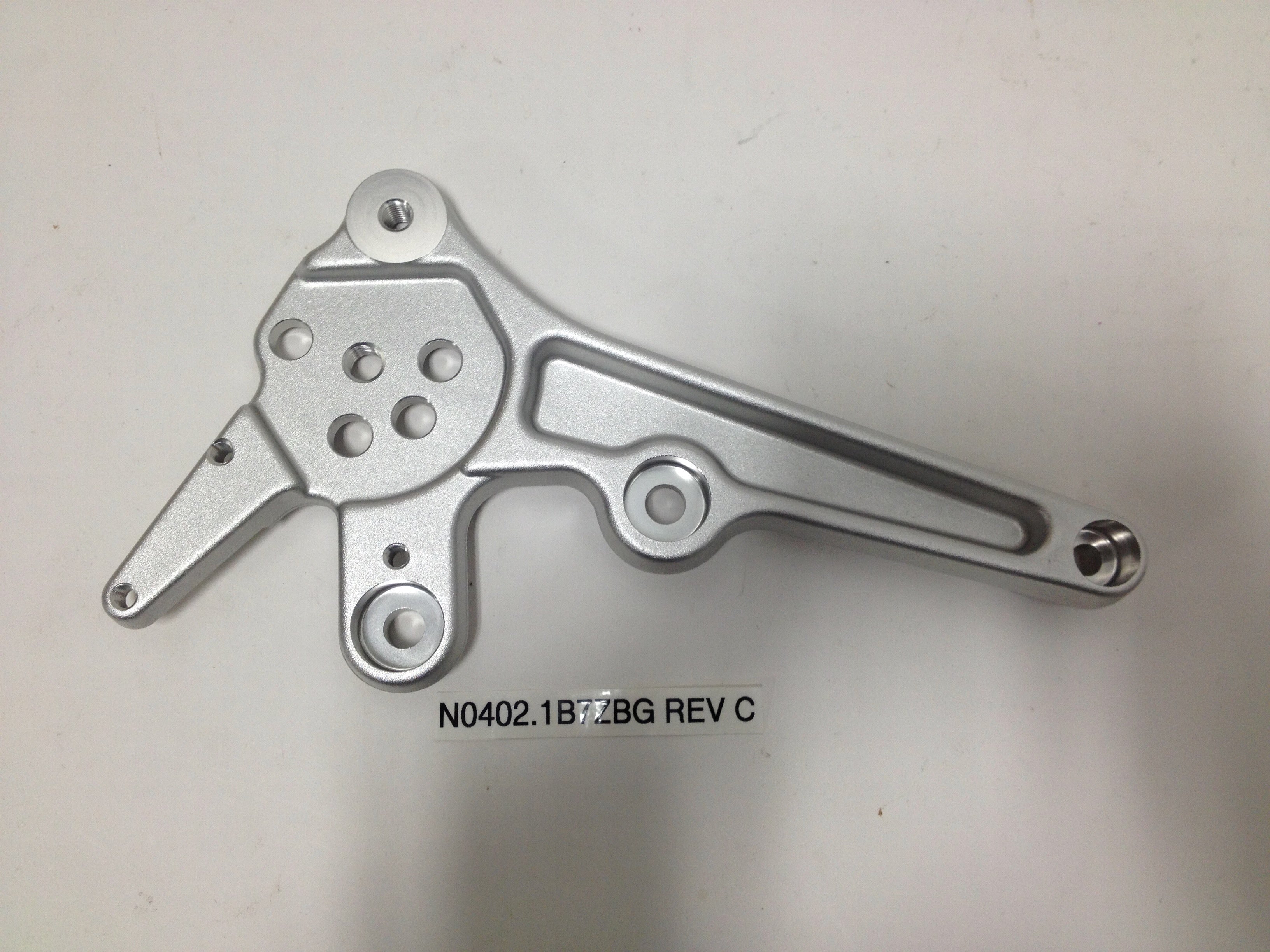 FOOTPEG SUPPORT, RIDER LEFT, CLEAR ANODIZED N0402.1B7ZBG Rev C