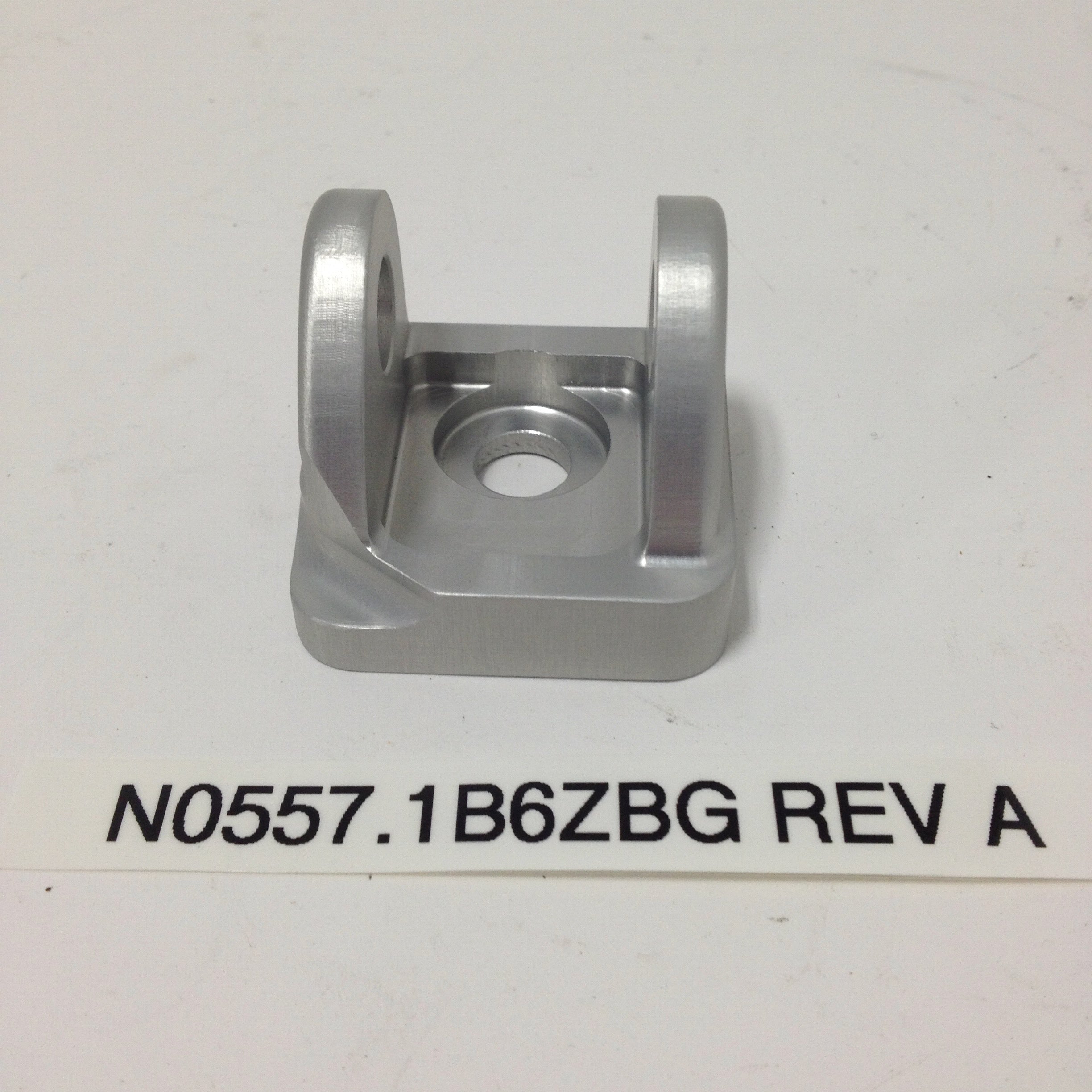 CLEVIS, FOOTPEG, RIGHT, ANODIZ N0557.1B6ZBG Rev A